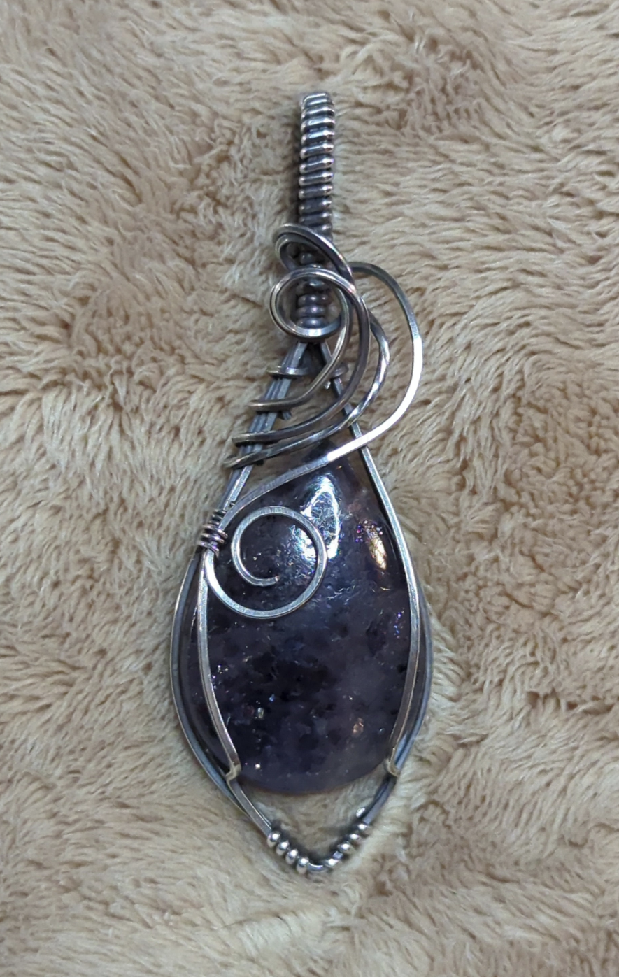 Iolite sunstone pendant, set in Sterling Silver.