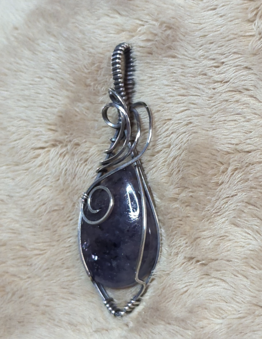 Iolite sunstone pendant, set in Sterling Silver.