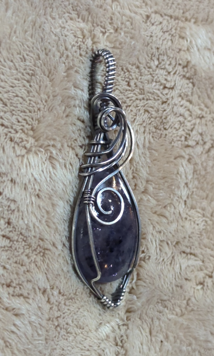 Iolite sunstone pendant, set in Sterling Silver.