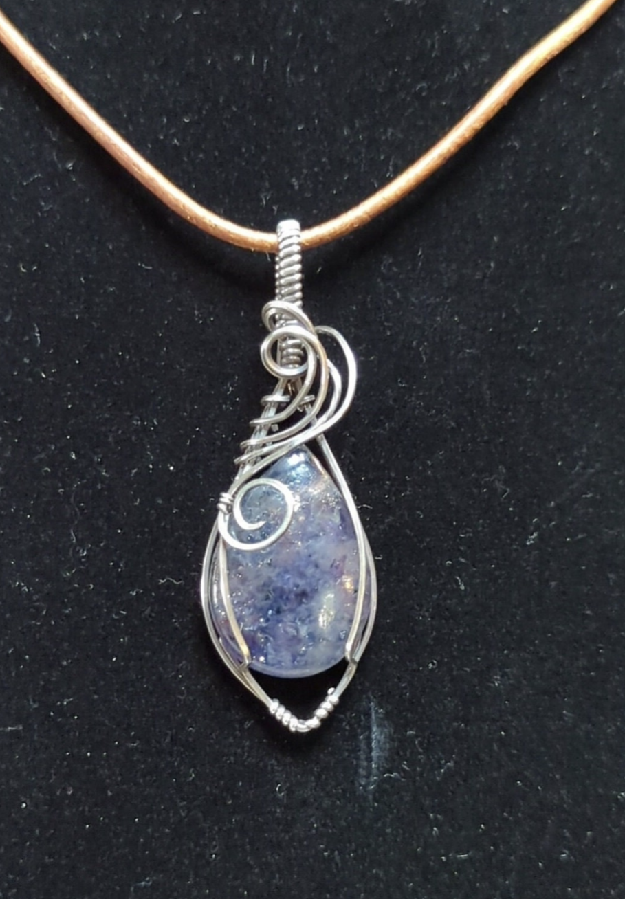 Iolite sunstone pendant, set in Sterling Silver.