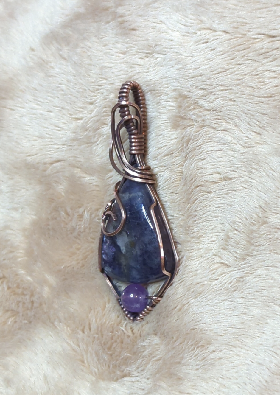 Iolite sunstone pendant, accented with Amethyst, set in antiqued copper.