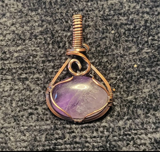 Amethyst pendant, set in antiqued copper.