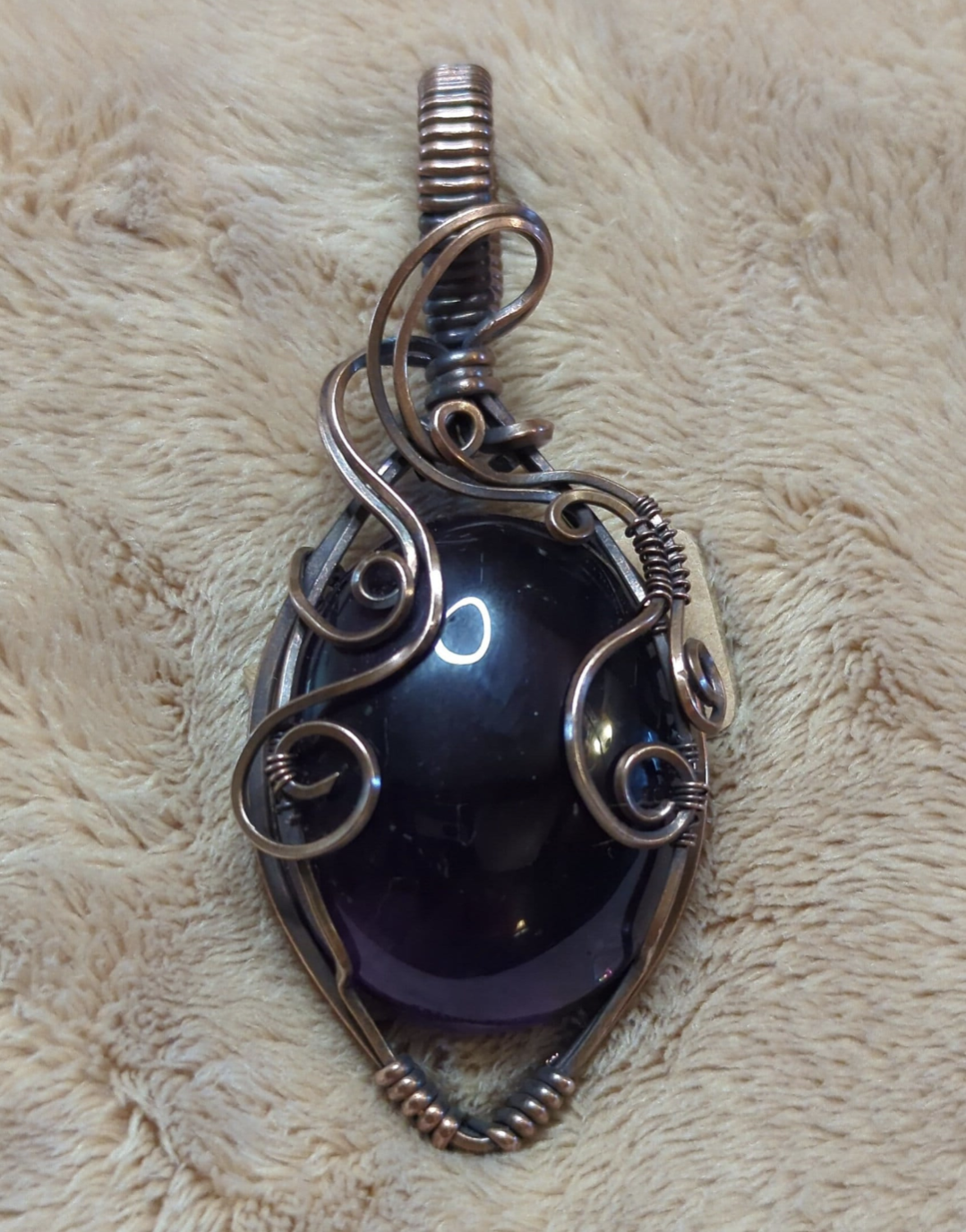 Amethyst pendant, set in antiqued copper.