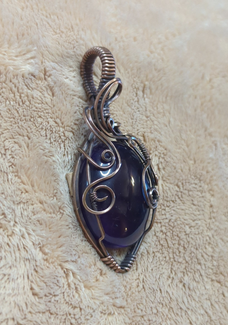 Amethyst pendant, set in antiqued copper.