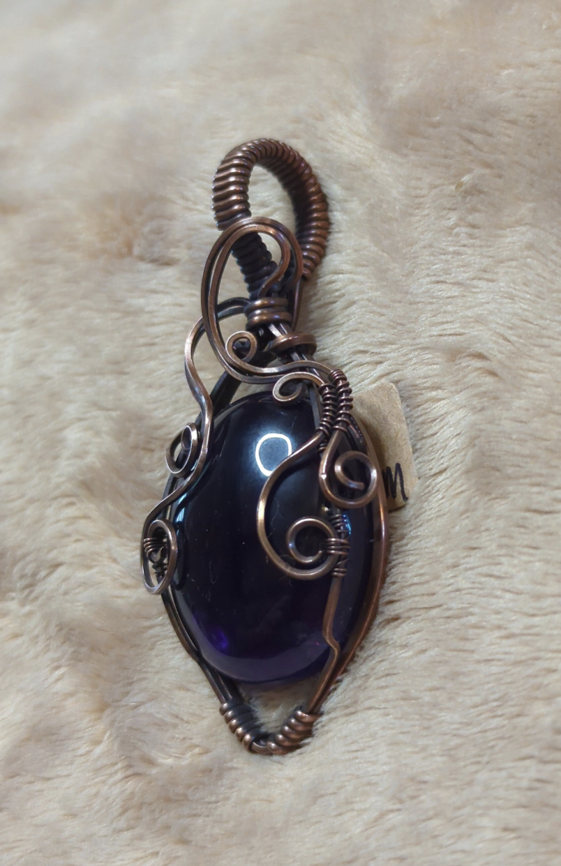 Amethyst pendant, set in antiqued copper.