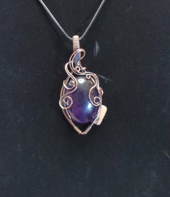 Amethyst pendant, set in antiqued copper.