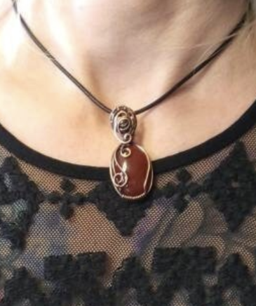 Carnelian gemstone Pendant, set in antiqued copper.