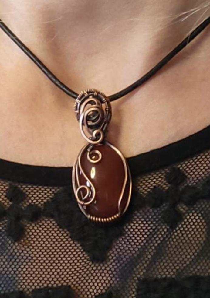 Carnelian gemstone Pendant, set in antiqued copper.