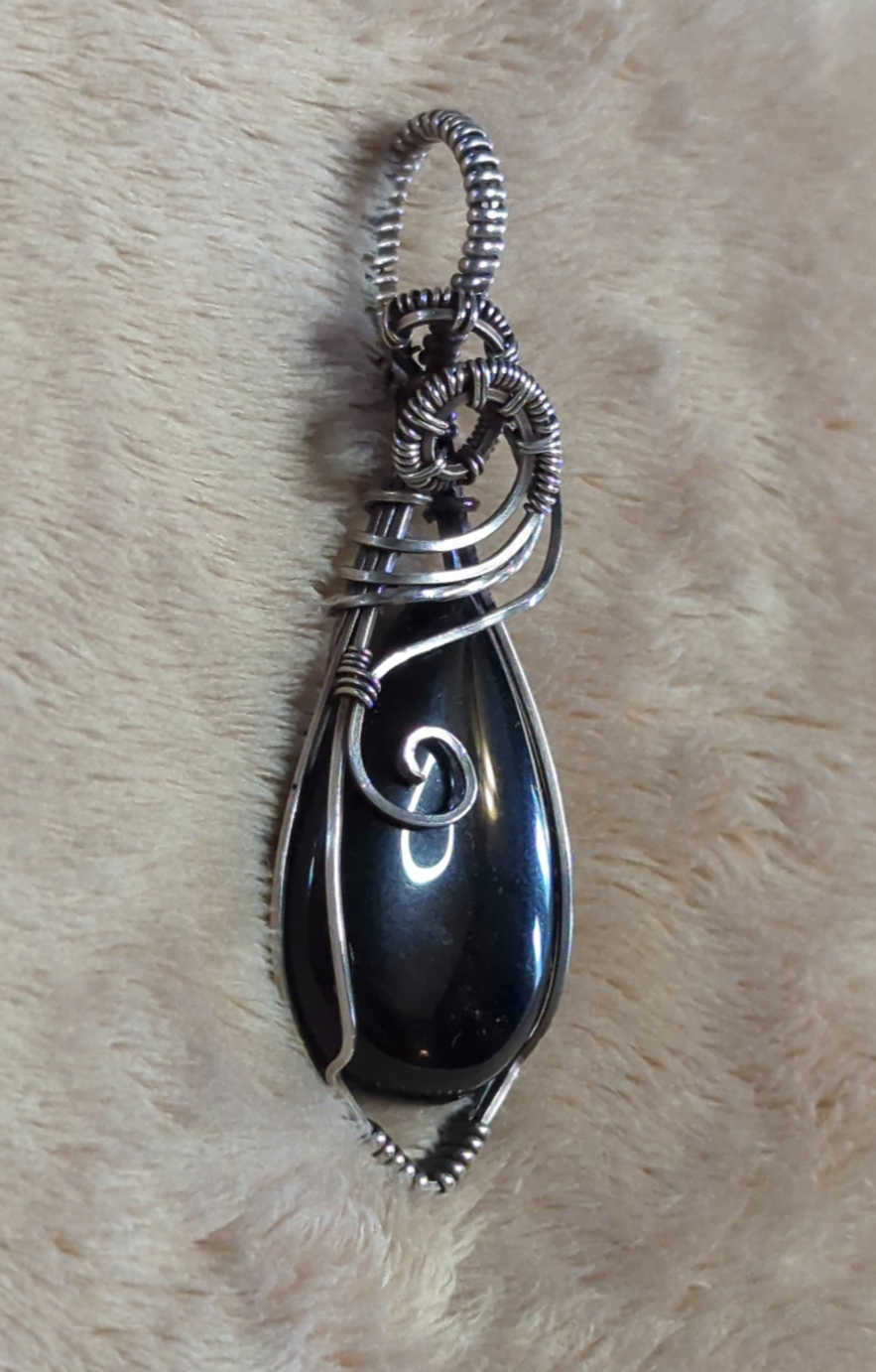 Obsidian Pendant, set in  Sterling Silver.