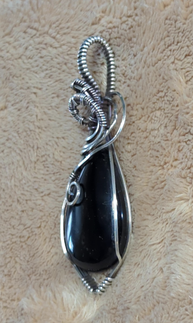 Obsidian Pendant, set in  Sterling Silver.