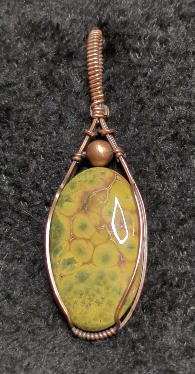 Ocean Jasper Pendant, accented with a copper bead, set in antiqued copper.