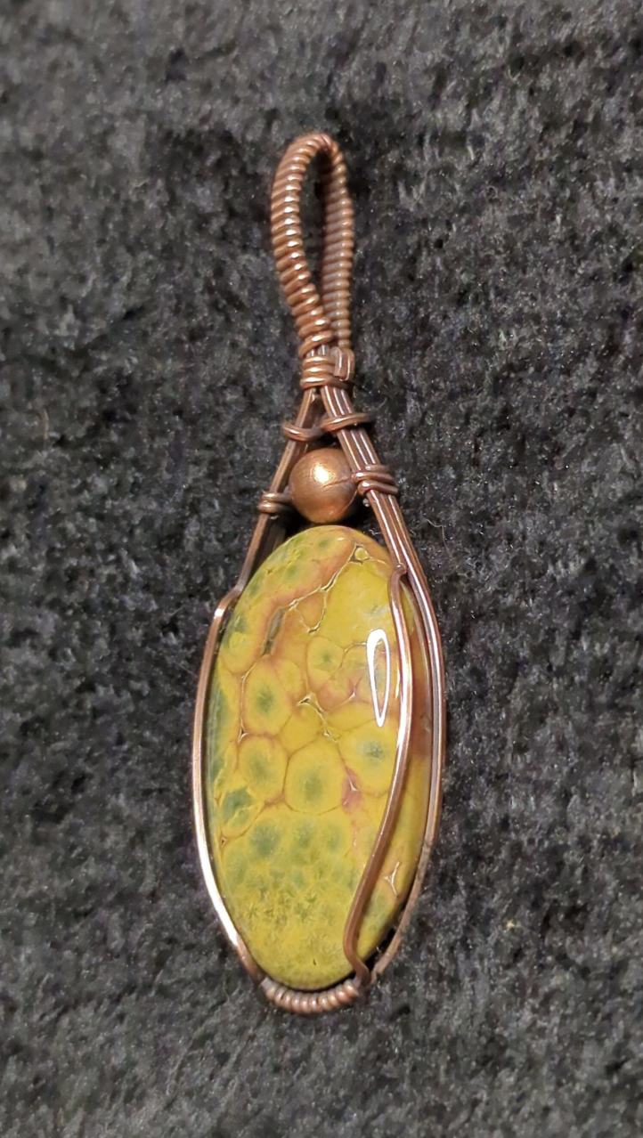 Ocean Jasper Pendant, accented with a copper bead, set in antiqued copper.