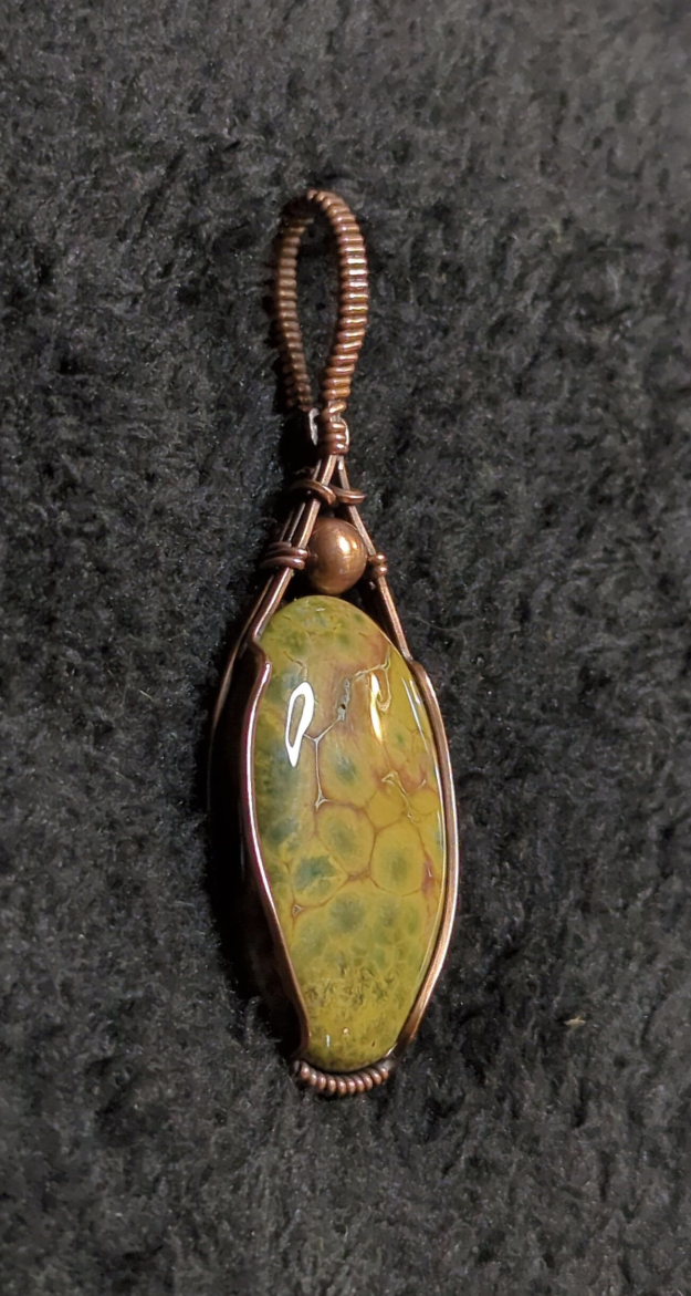 Ocean Jasper Pendant, accented with a copper bead, set in antiqued copper.