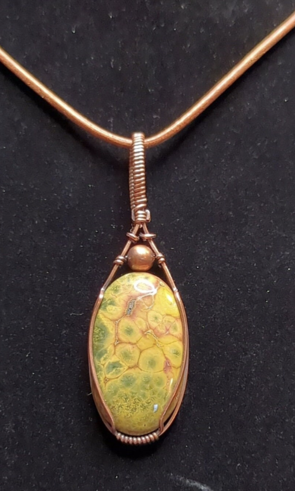 Ocean Jasper Pendant, accented with a copper bead, set in antiqued copper.