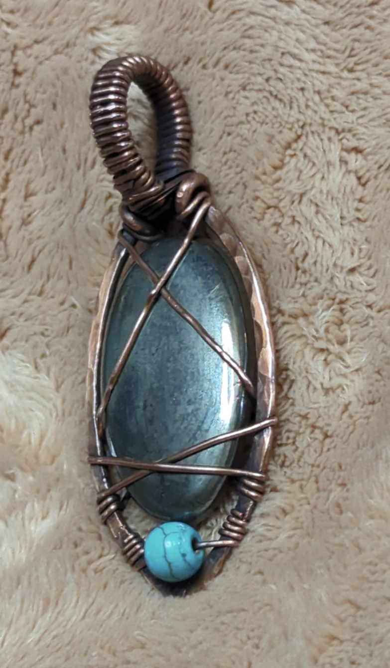 Pyrite Pendant, set in hammered antiqued copper, accented with Turquoise.