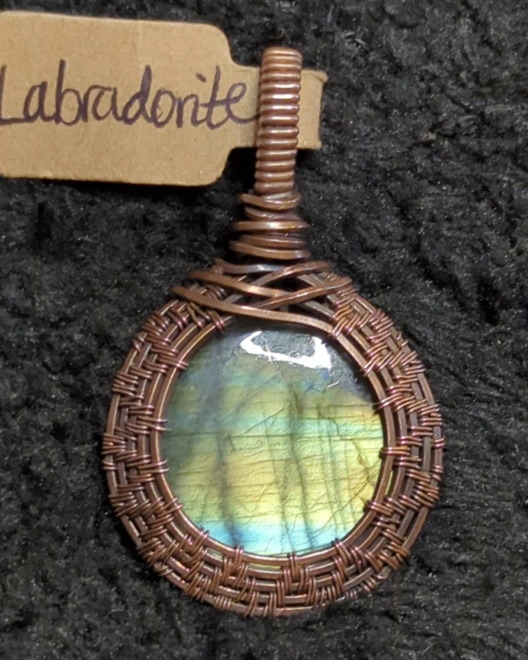 Labradorite gemstone pendant, with green and blue flash, set in antiqued copper.