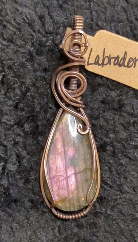 Labradorite gemstone pendant, with rare purple flash, set in antiqued copper.