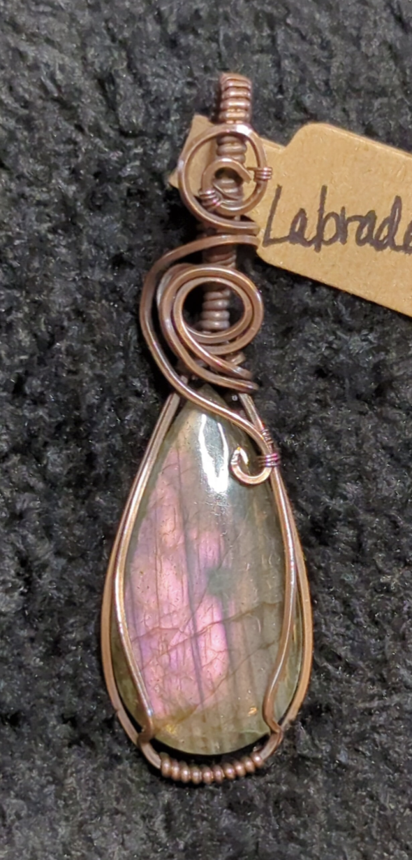 Labradorite gemstone pendant, with rare purple flash, set in antiqued copper.