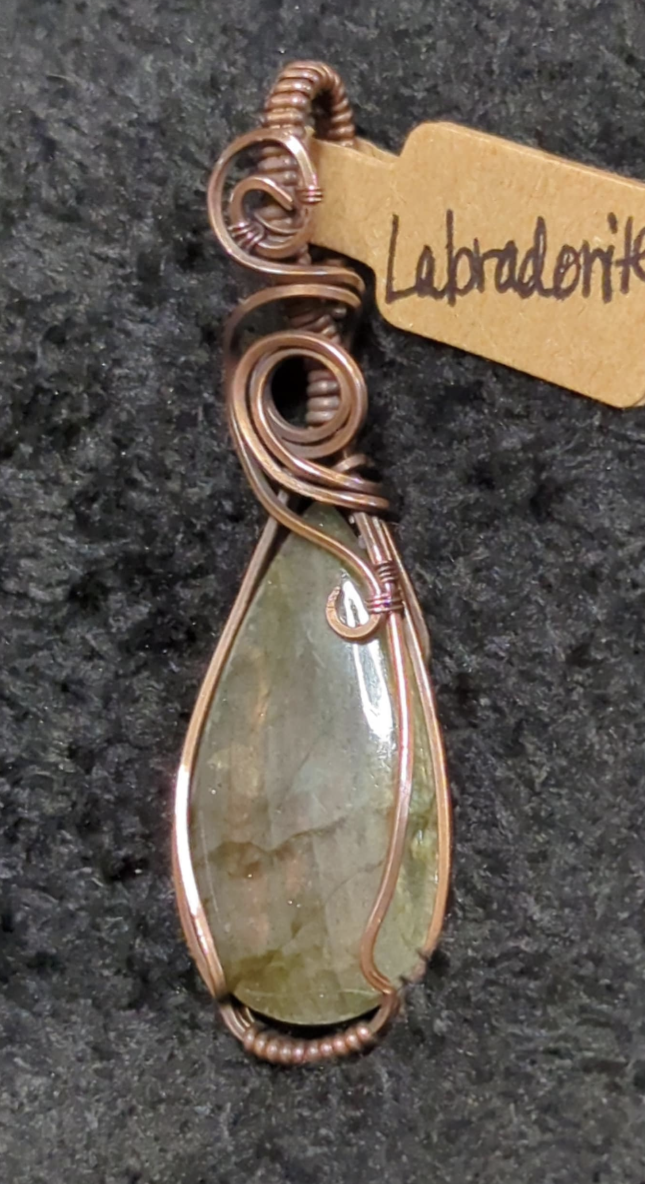 Labradorite gemstone pendant, with rare purple flash, set in antiqued copper.