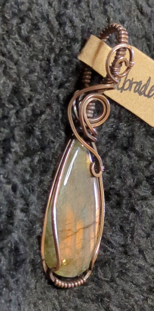 Labradorite gemstone pendant, with rare purple flash, set in antiqued copper.