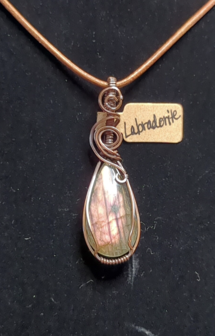 Labradorite gemstone pendant, with rare purple flash, set in antiqued copper.