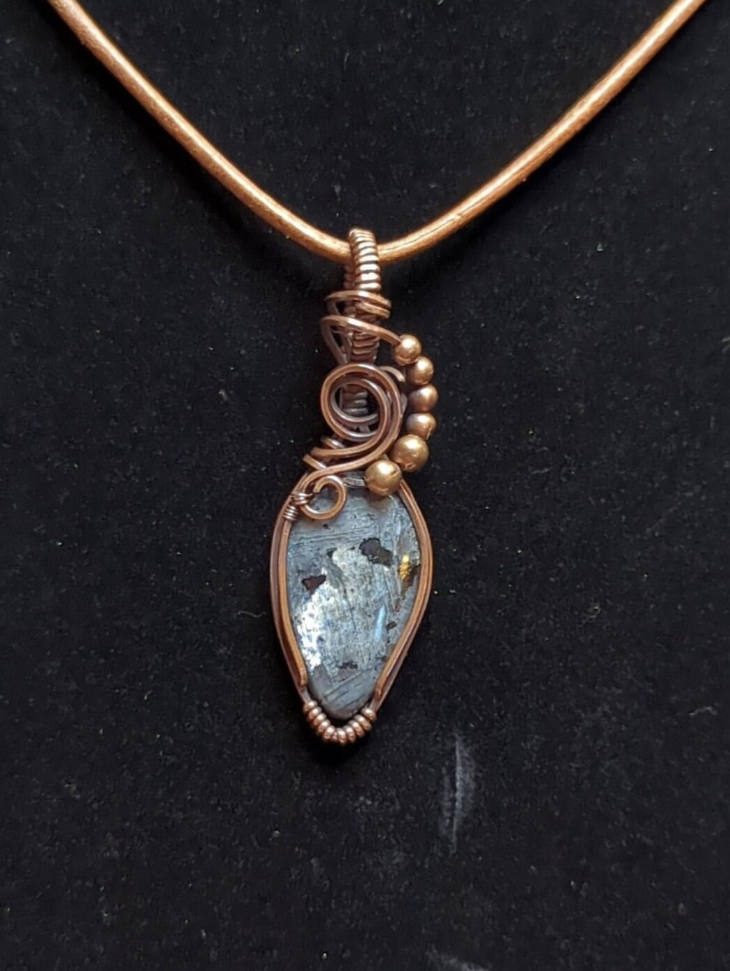 Larvakite gemstone pendant, also known as Black Moonstone, accented with copper beads, set in antiqued copper.