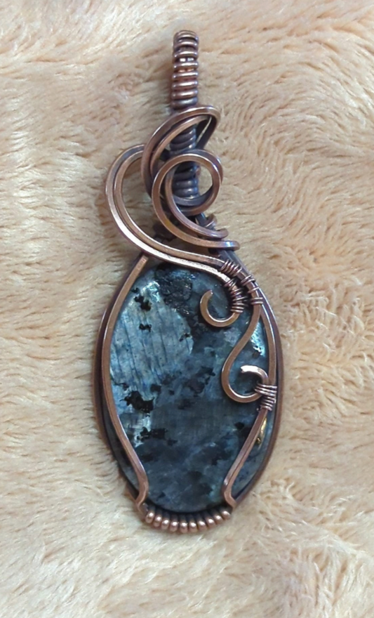 Larvakite gemstone pendant, also known as Black Moonstone, set in antiqued copper.