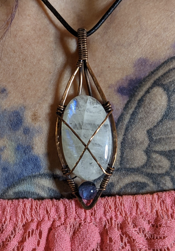 Moonstone gemstone pendant set in antiqued copper, accented with blue fluorite.