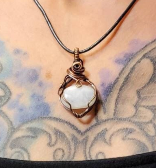 Moonstone  pendant, with a blue flash. Set in antiqued copper.