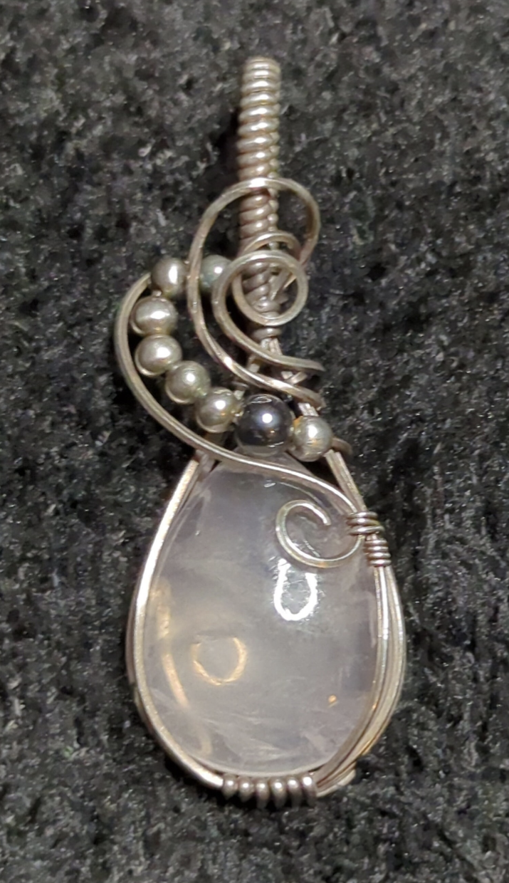 Rose Quartz Pendant, set in Sterling Silver